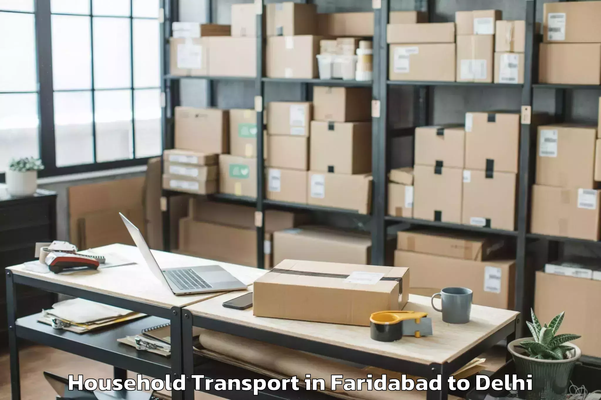 Professional Faridabad to Jmd Kohinoor Mall Household Transport